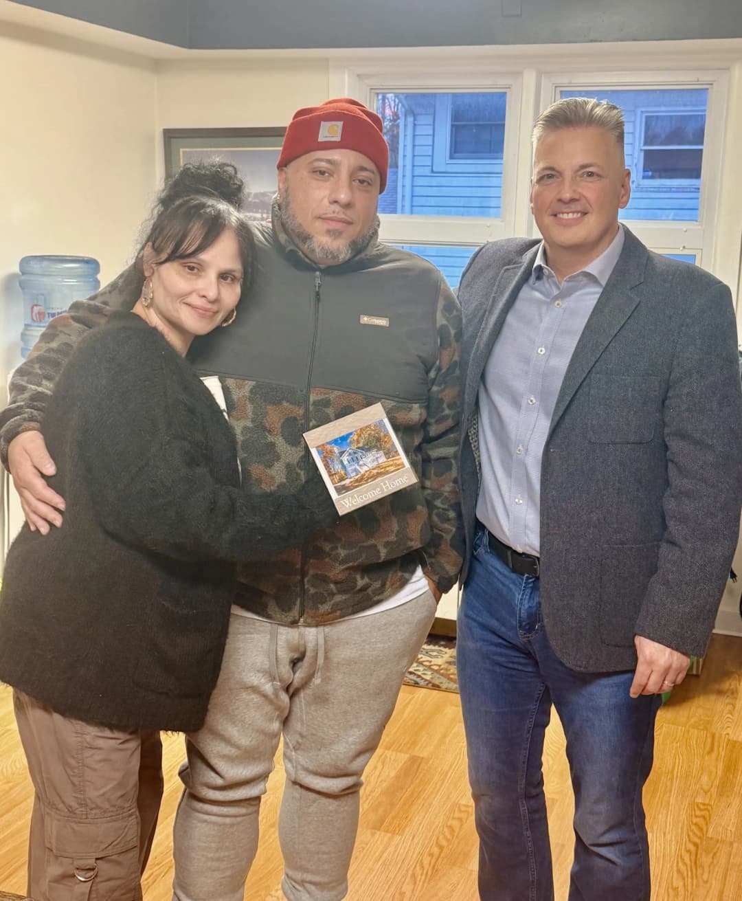 Scott Cole with happy homeowners at closing